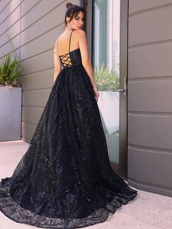 Side view of the blue sequin prom dress, highlighting the sparkling fabric.