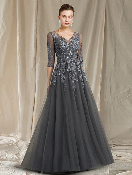 Elegant A-line V-neck mother of the bride dress with half sleeves and lace appliques.