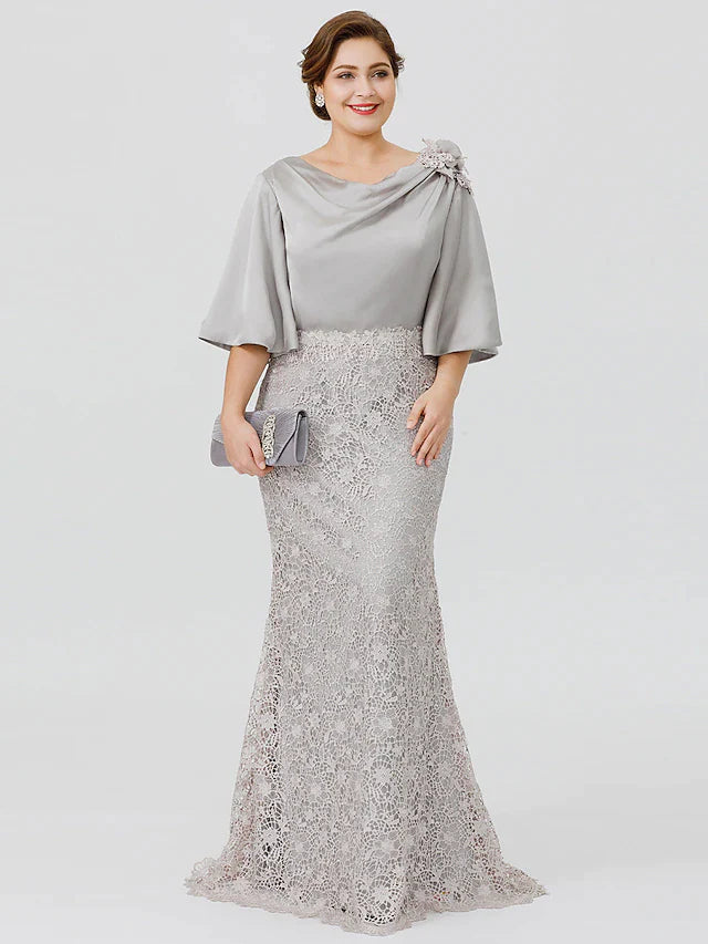 Plus size mermaid mother of the bride dress with cowl neck and half sleeves.