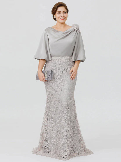 Plus size mermaid mother of the bride dress with cowl neck and half sleeves.