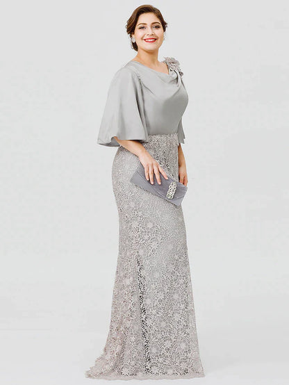 Cowl neck and half sleeve detail of a satin lace dress.