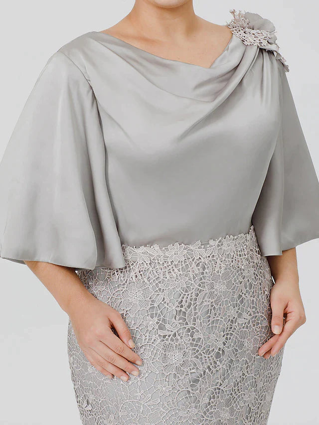 Elegant sweep train of a mermaid mother of the bride dress.