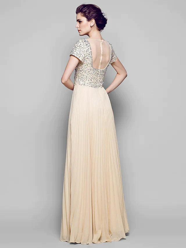 Side view of the floor-length sequined chiffon tulle Mother of the Bride dress.