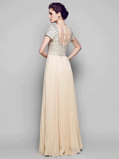 Side view of the floor-length sequined chiffon tulle Mother of the Bride dress.
