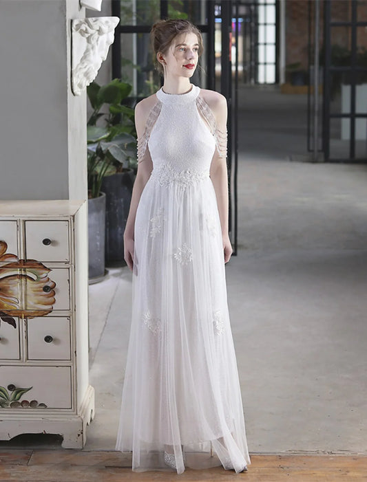 Model wearing a sparkling A-line high neck short sleeve floor-length sequin prom dress.
