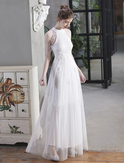 Another angle of a model in an elegant high neck sequin party dress.