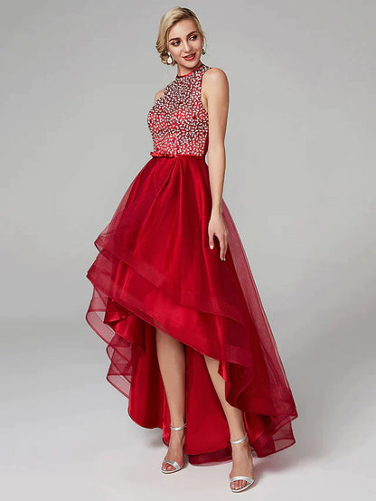 Back view of the A-line cocktail dress, highlighting the keyhole and asymmetrical hem.