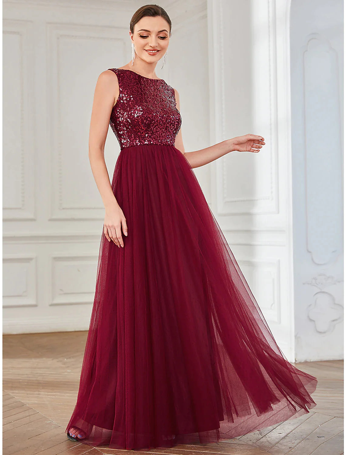 Close-up of the sequin and tulle detail on the A-line dress.