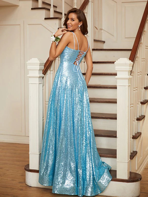 Close-up of the sequined bodice and ruffled details on the A-line prom dress.