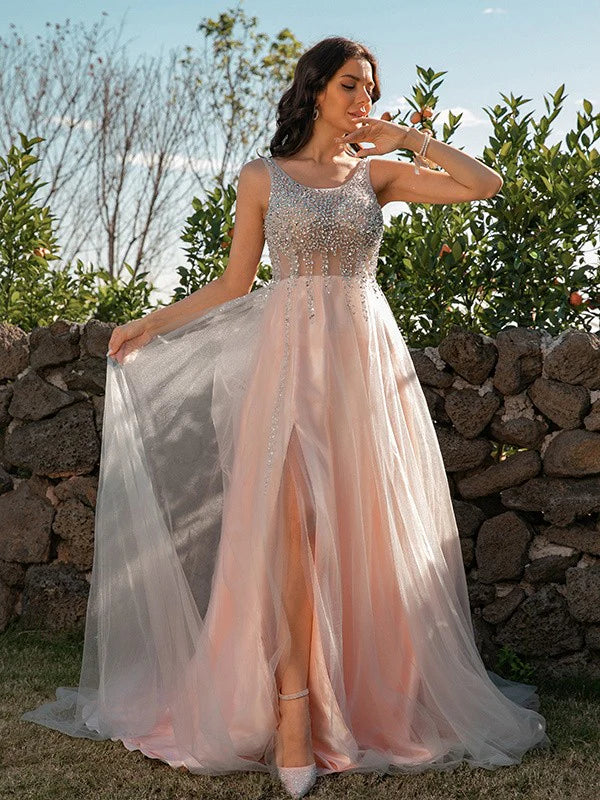 Full view of a sparkling A-Line Princess prom dress with sequin straps and tulle skirt.