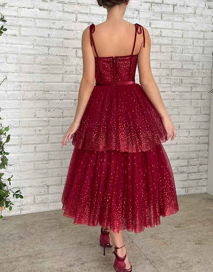 Close-up of the glitter tulle fabric on the A-line dress.