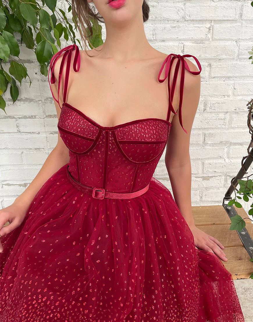 Side view of the glitter A-line prom dress on a model.