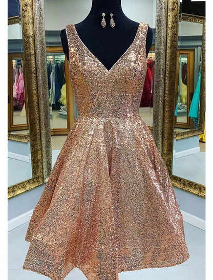 Woman in sparkling A-line V-neck tea length sequined homecoming dress, front view.