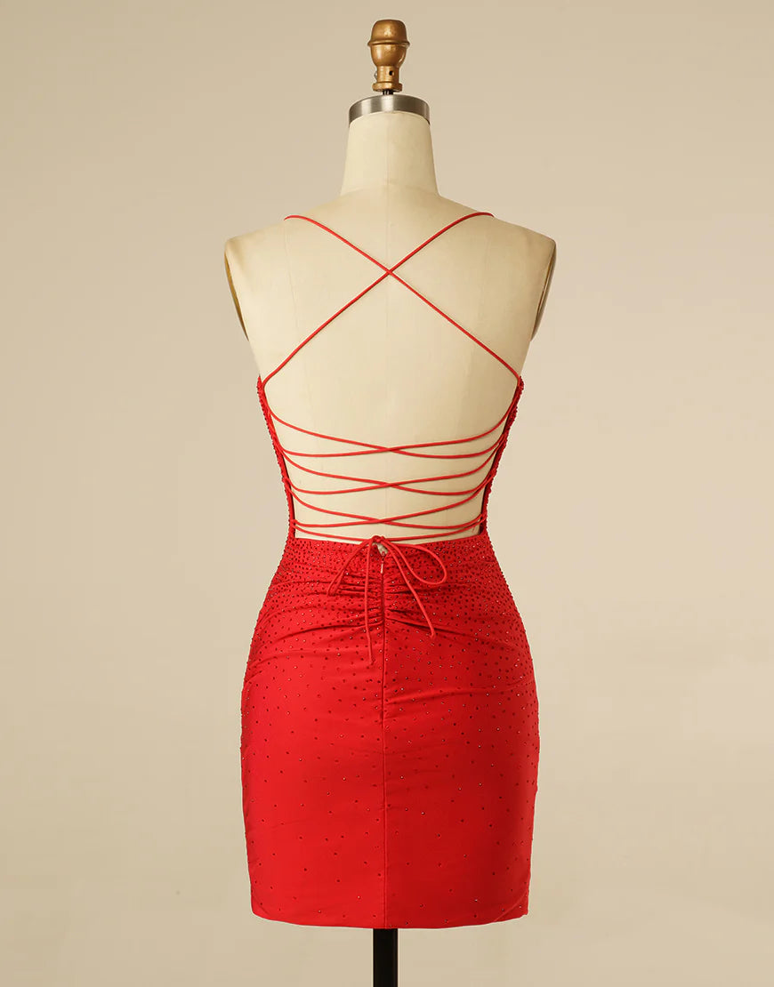 Detail of the sweetheart neckline and sparkling embellishments on the dress.