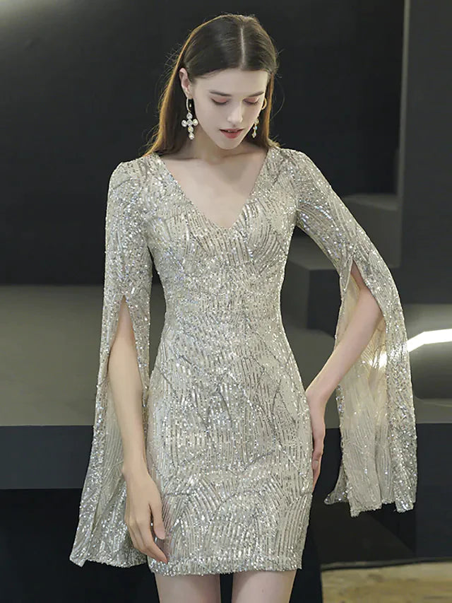 Woman in an elegant V-neck long sleeve sequined mini dress.