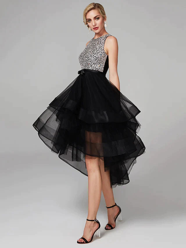 Back view of the high-low cocktail dress, highlighting the cascading ruffles.