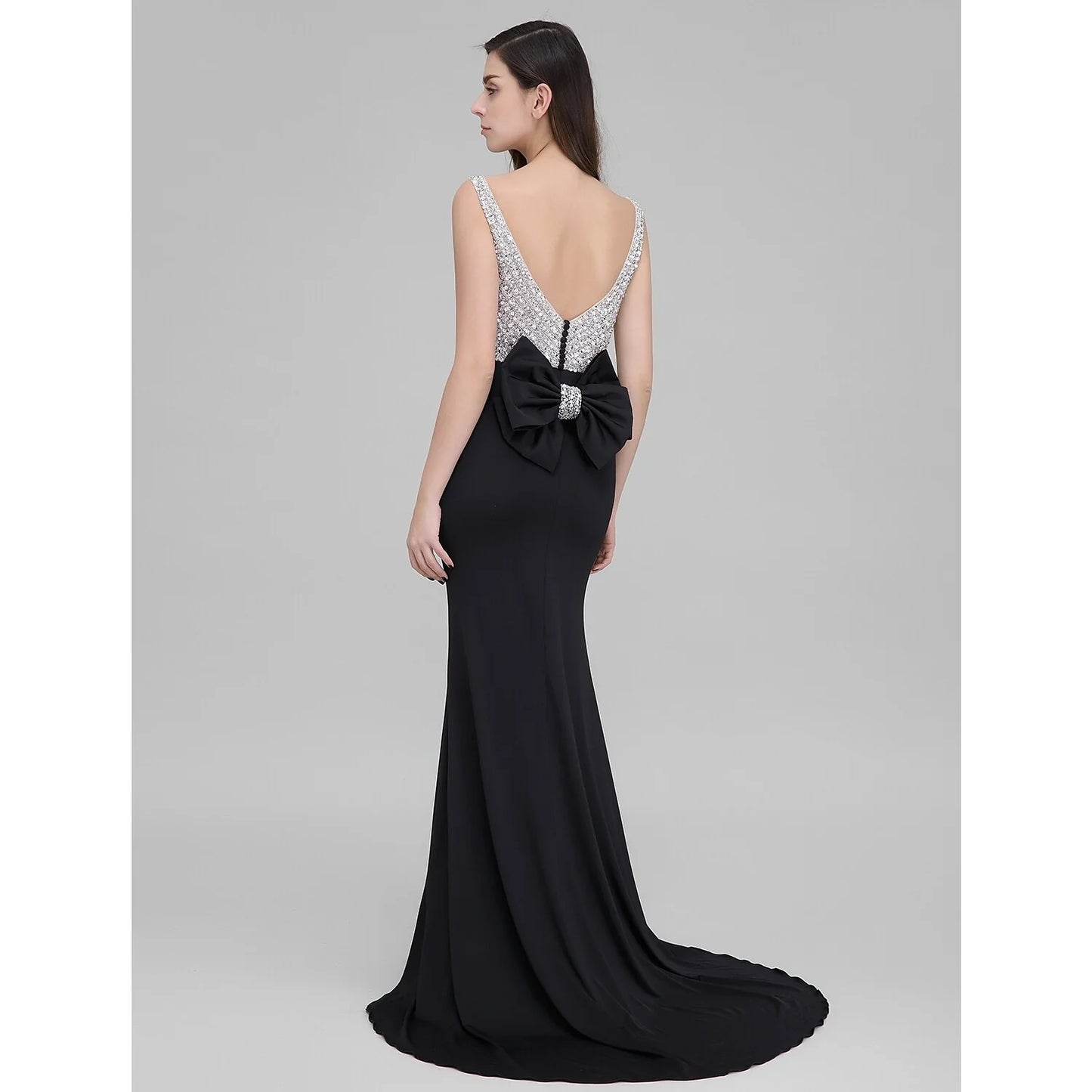 Back view of the sparkling mermaid trumpet dress, showing the court train.