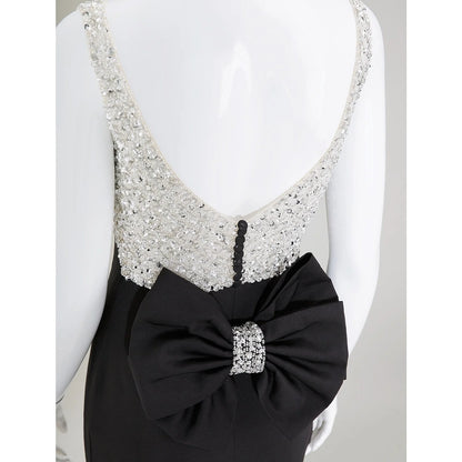 Front view of the shimmering jersey mermaid trumpet dress.