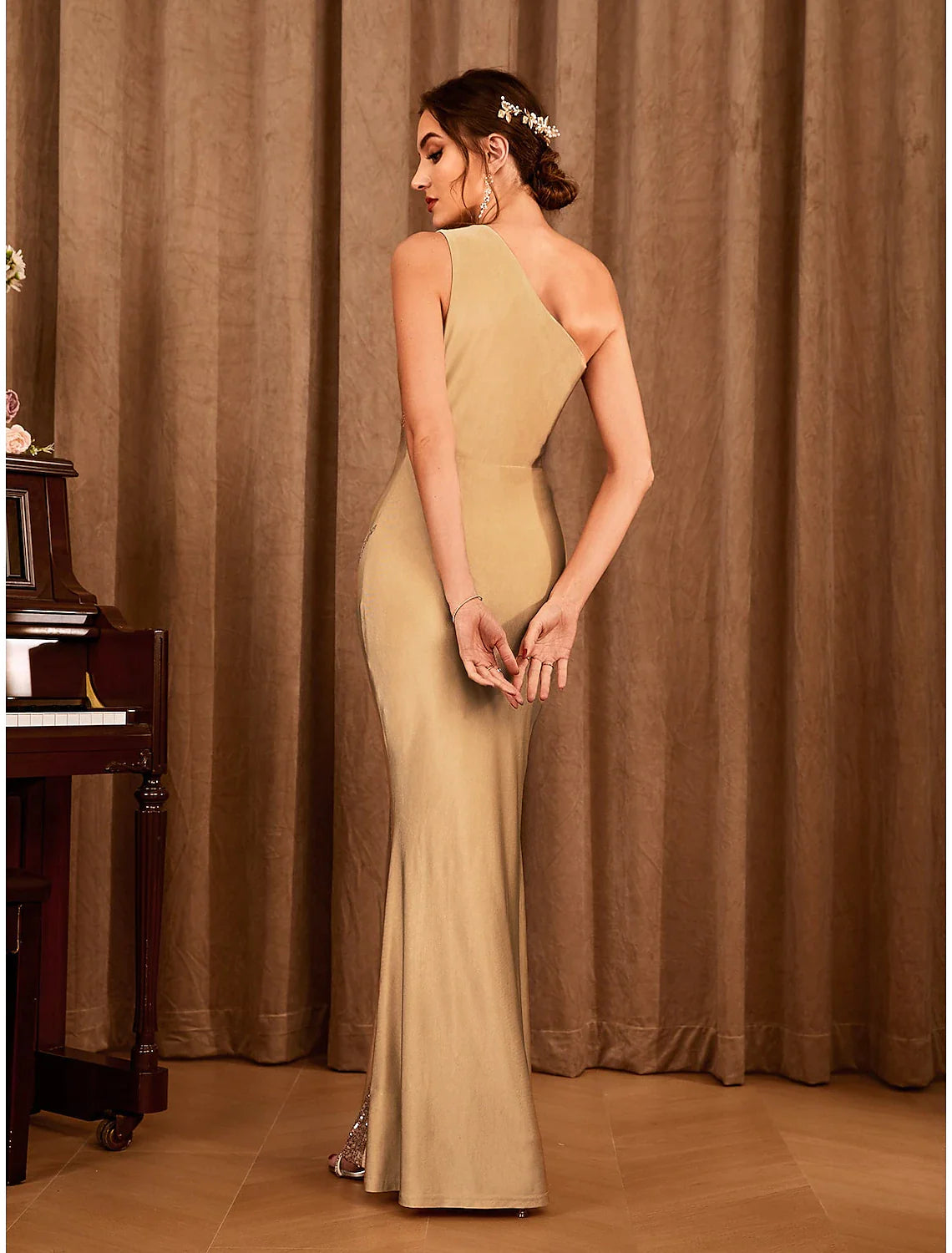 Close-up of the glitter stretch satin fabric on the mermaid party dress.