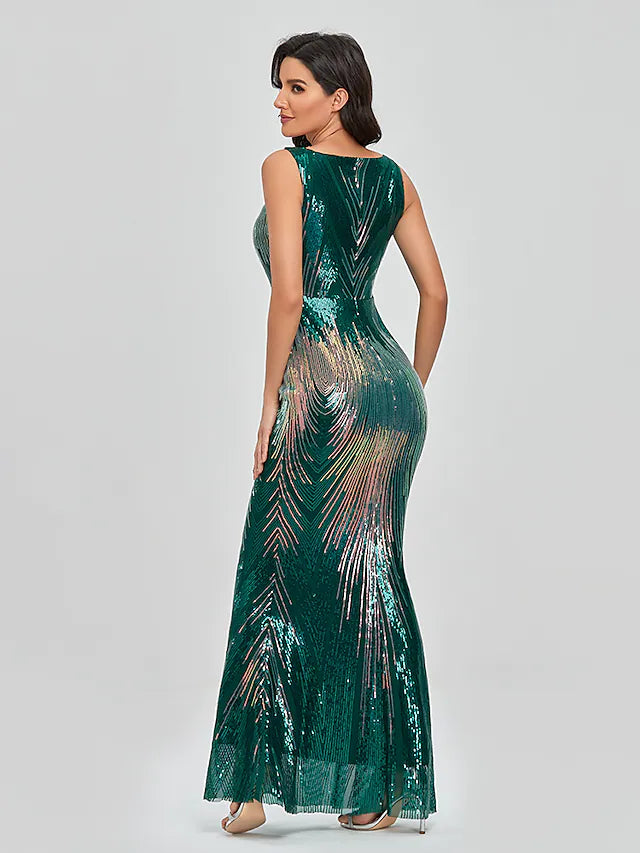 Side view of a woman in a shimmering sequin mermaid trumpet gown.