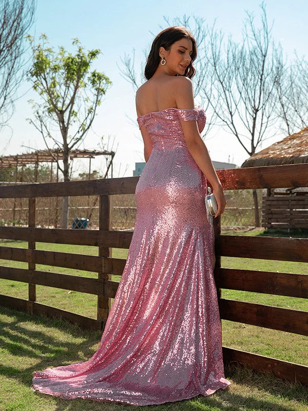 Side view of the elegant sequin off-the-shoulder gown with ruffle details.