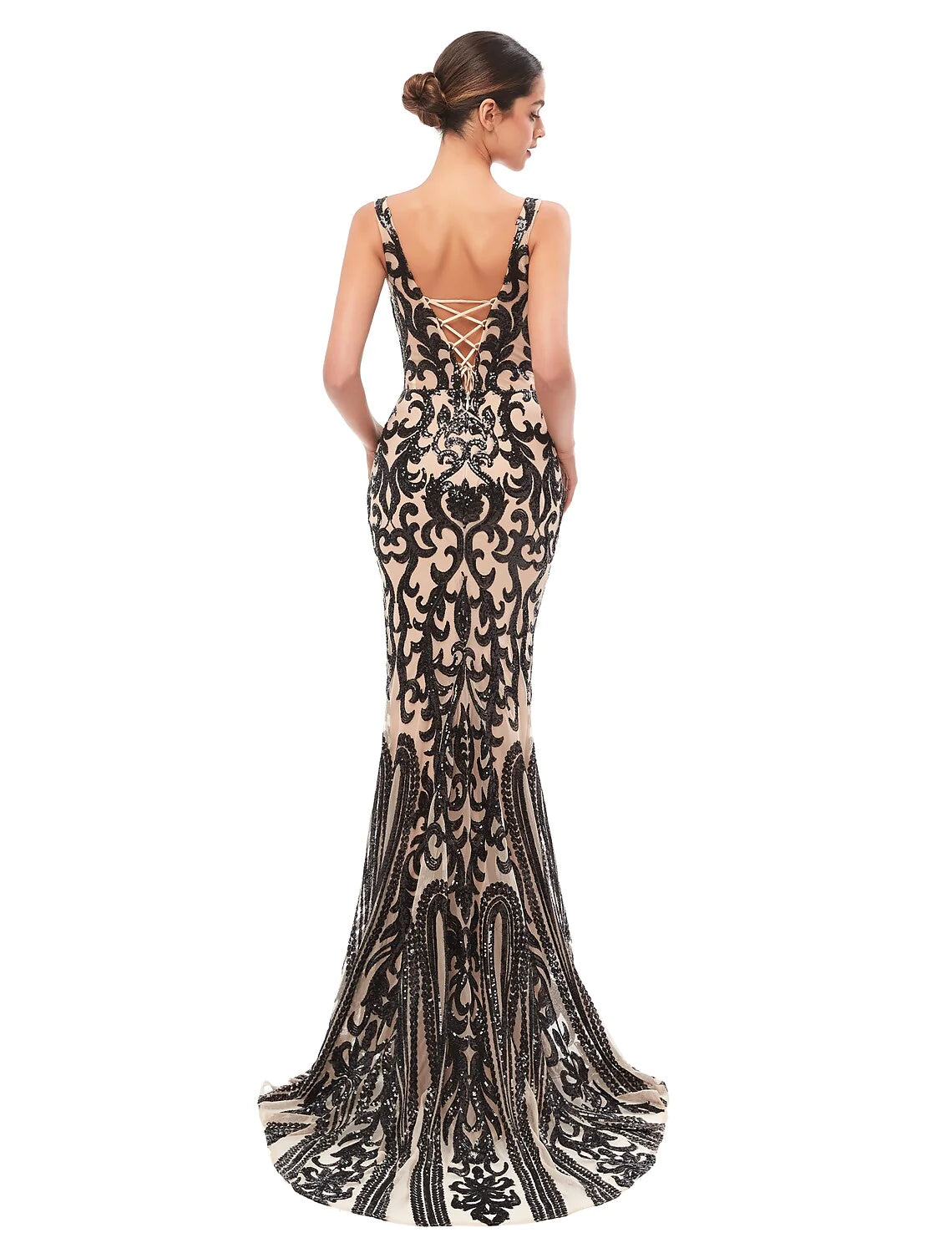 Side view of the mermaid trumpet evening gown, highlighting the sequin details and court train.