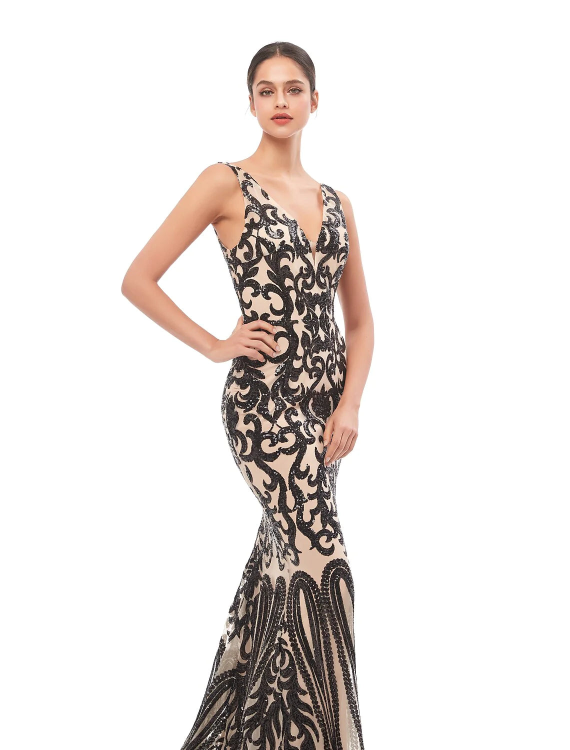 Back view of the sequin tulle evening gown, showcasing the court train.