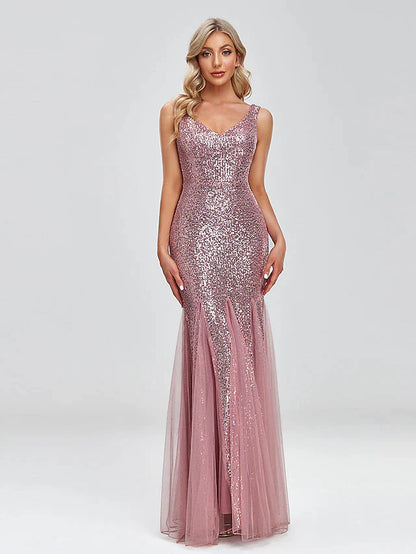 Back view of sparkling two-piece mermaid prom dress with V-back and floor-length train.
