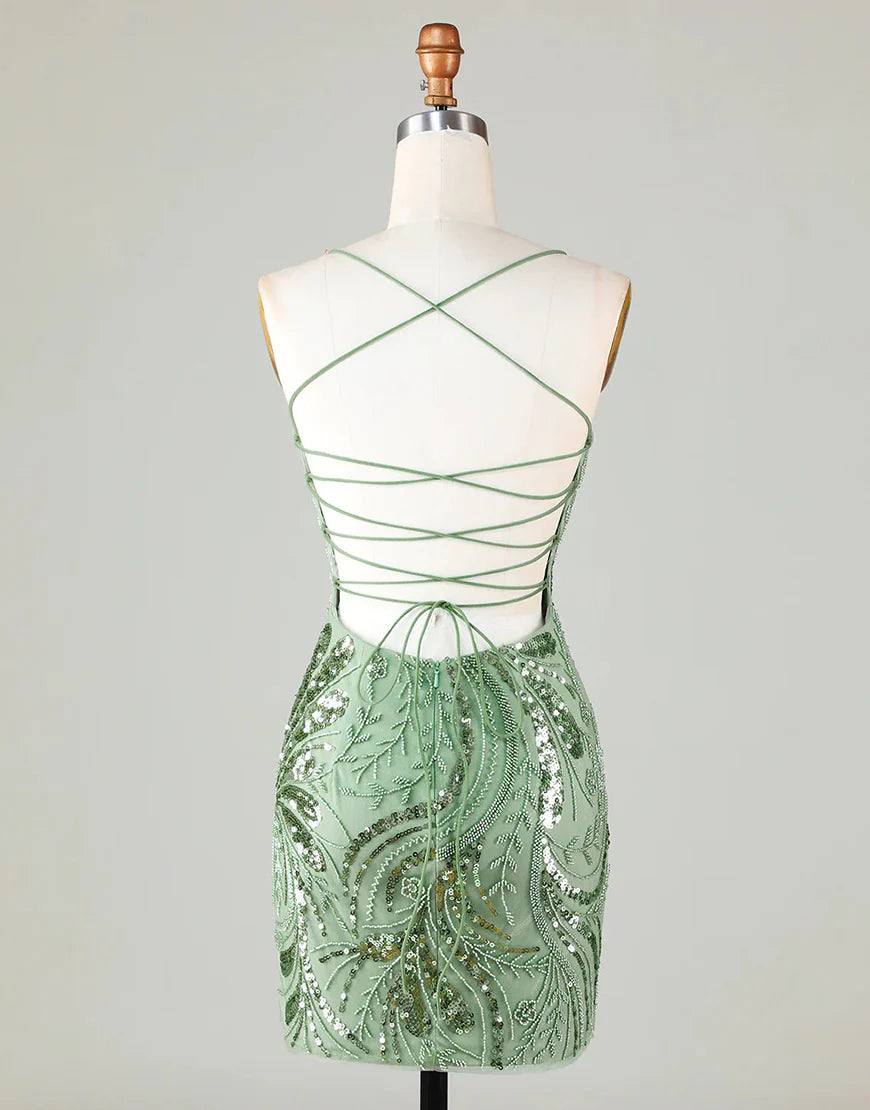 Close-up of criss-cross back and sparkly fabric on royal blue dress.