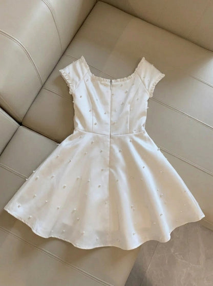Stunning A-Line Sweetheart Pearl Bow Satin Ivory Mini Homecoming Dress