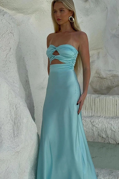 Model wearing a Tiffany aqua blue silk satin strapless sheath long prom dress, standing elegantly.