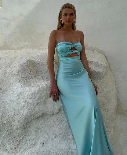 Full-length view of a Tiffany aqua blue silk satin strapless prom dress on a model.