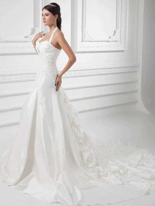 Side view of A-Line wedding dress, showcasing the flowing court train.