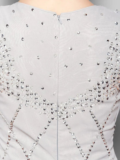 Full length view of the vintage-inspired formal gown.