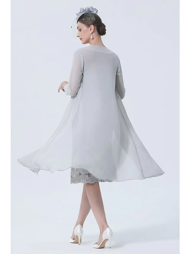 Side view of the two-piece chiffon and lace mother of the bride dress.