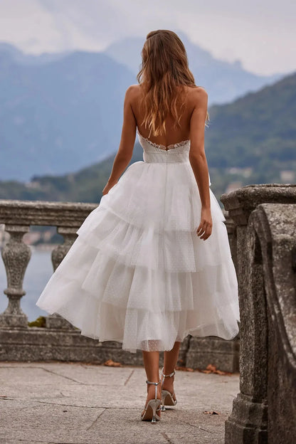 Whimsical A-Line Halter Tiered Ruffle Backless Polka-Dot White Midi Prom Dress