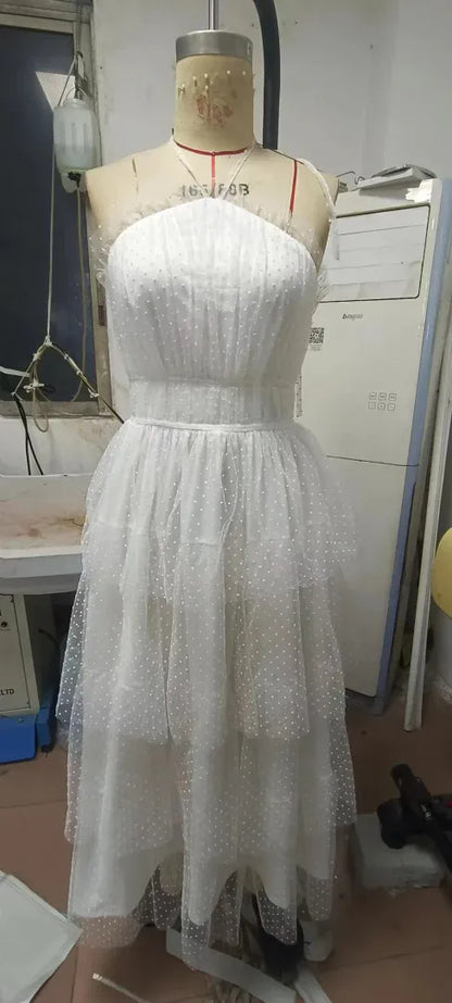 Whimsical A-Line Halter Tiered Ruffle Backless Polka-Dot White Midi Prom Dress