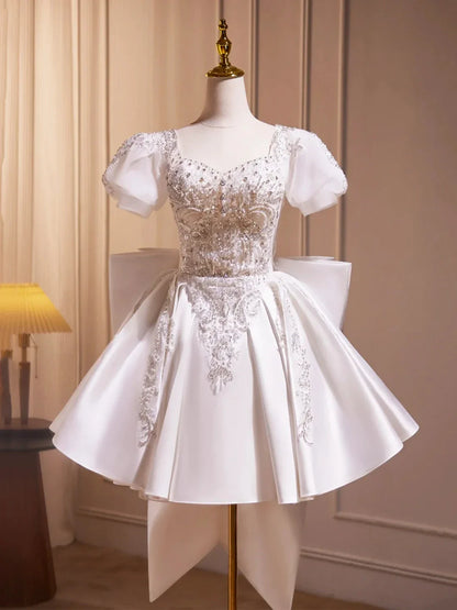 White Satin Beaded Knee Length Prom Dress Cute A-Line Short Sleeve Party Dress with Bow